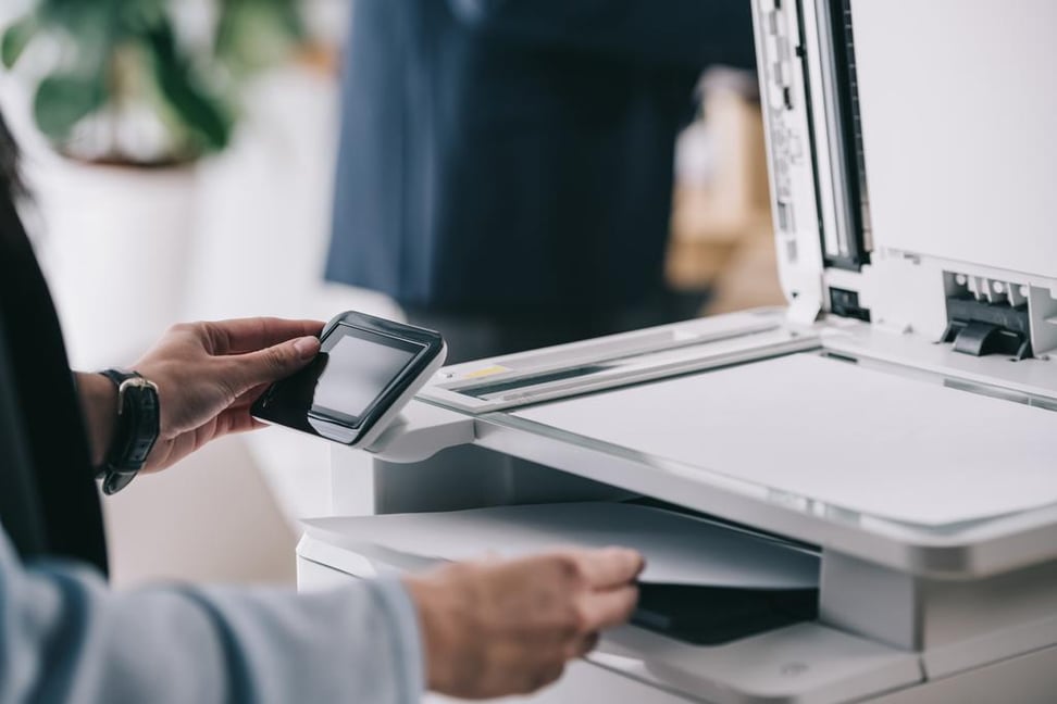 stock-photo-cropped-shot-woman-formal-wear printer lease know home office reply